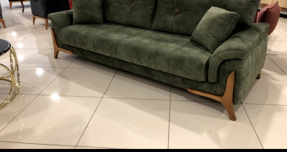Custom tufted sofa reupholstery